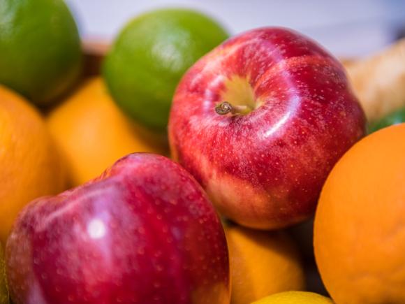 Vibrant apples, oranges, and limes.