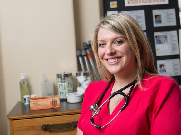 nursing student sitting in chair